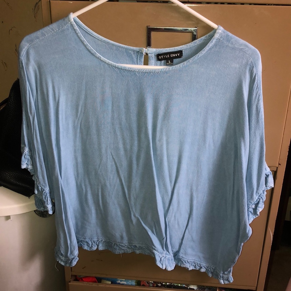 blue women’s shirt